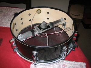 Here is the snare with the electric components all mounted inside of it. Note the snare wire serves absolutely no purpose here.